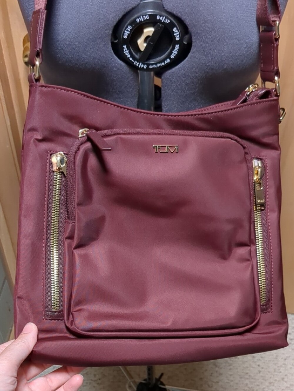 Tumi Maroon Crossbody Bag with Gold Hardware - Picture 2 of 6